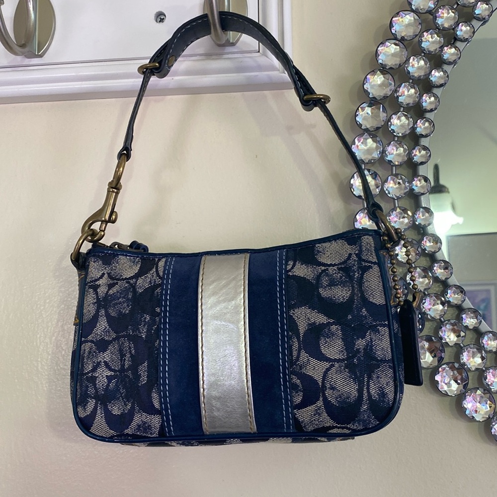 EUC Coach 💙🤍
Vintage Beautiful 
Perfect for a night out